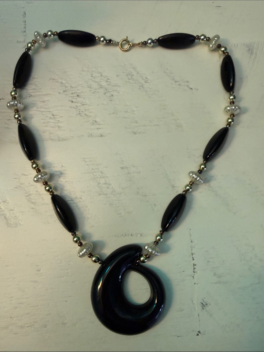 Elegant Black Pendant Necklace with Pearl Accents